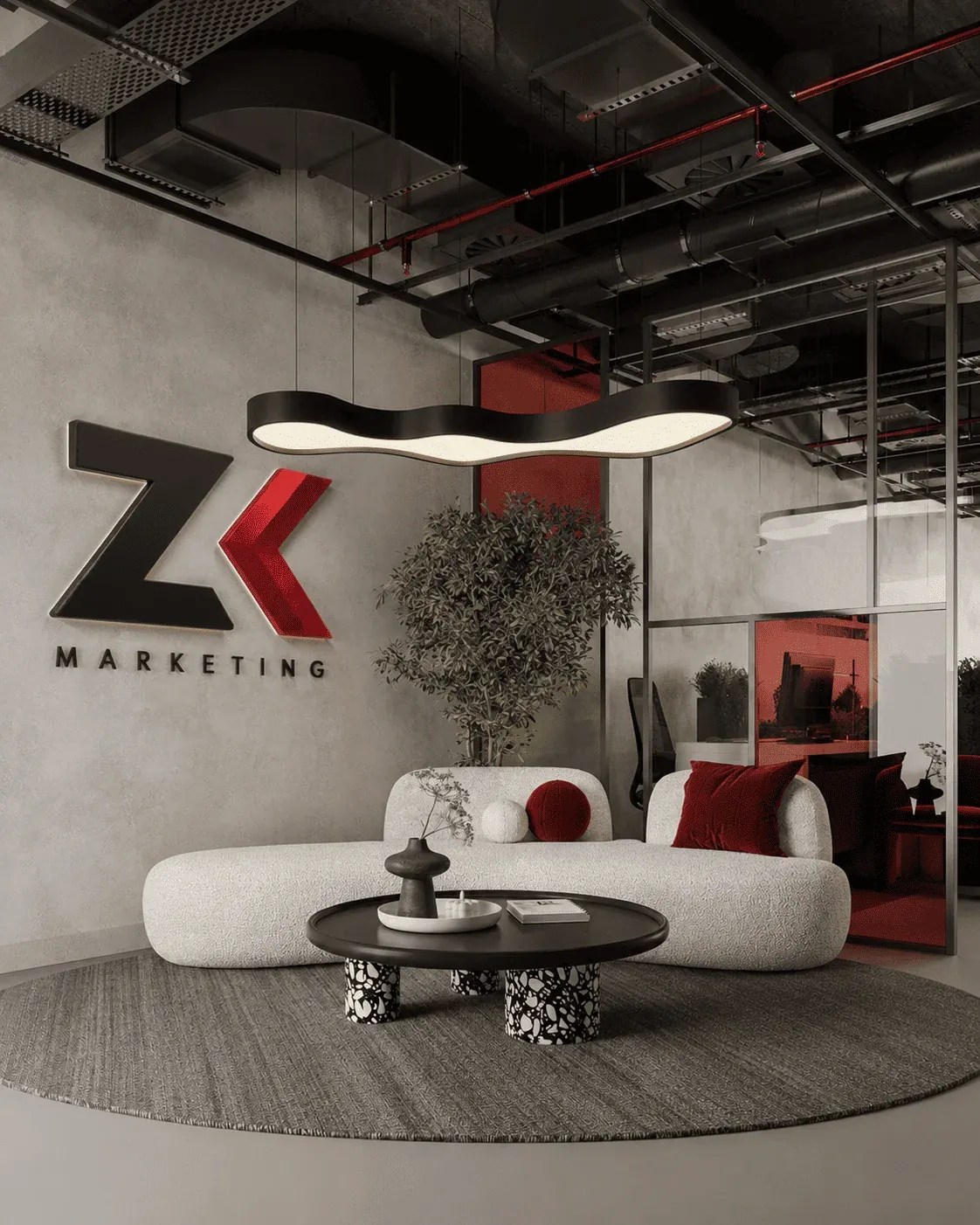 Oficina ZK Marketing con logo en pared